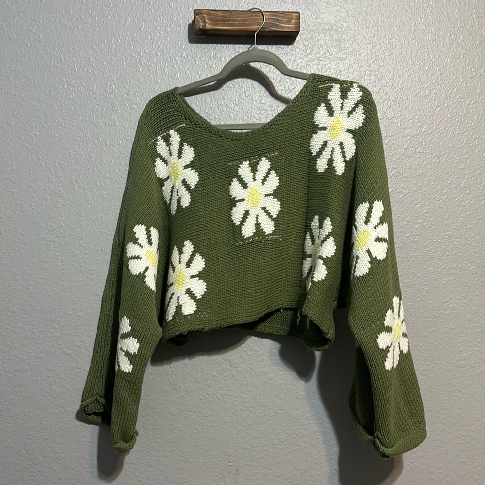 Green Storia sweater with floral print and cropped. Size small. Not worn much.
